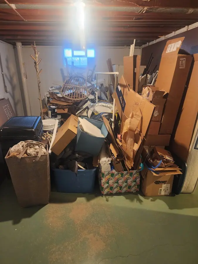 Roll-off dumpster container at job site for Construction Dumpster Rental in Bay City